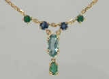 collier émeraudes, saphirs et aigue-marine